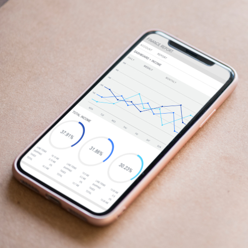 Smartphone displaying financial graphs and statistics.