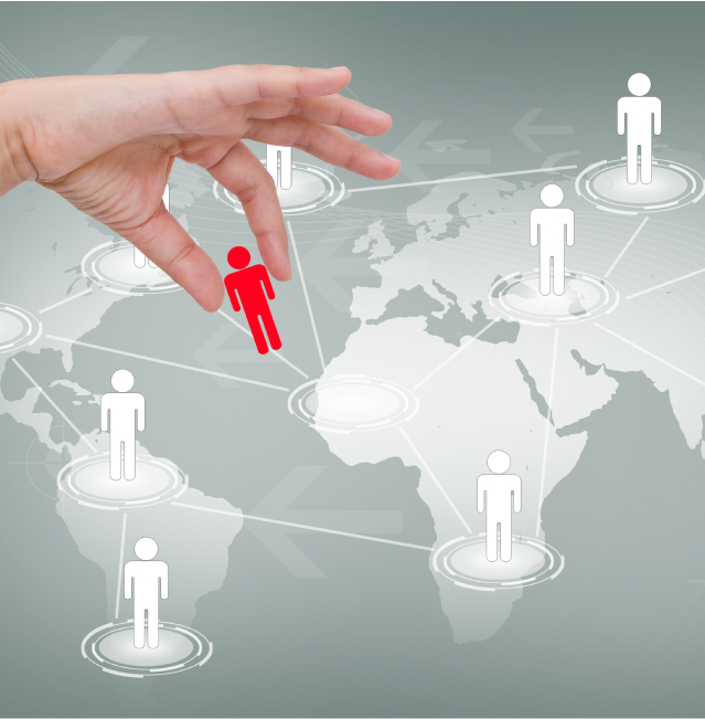 Una mano seleccionando una figura humana roja entre figuras blancas en una red global digital.